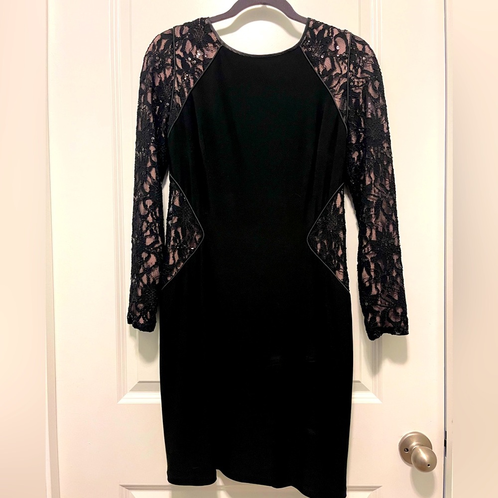 Ralph Lauren cocktail dress, size 8 with stretch. Flattering lines and details.